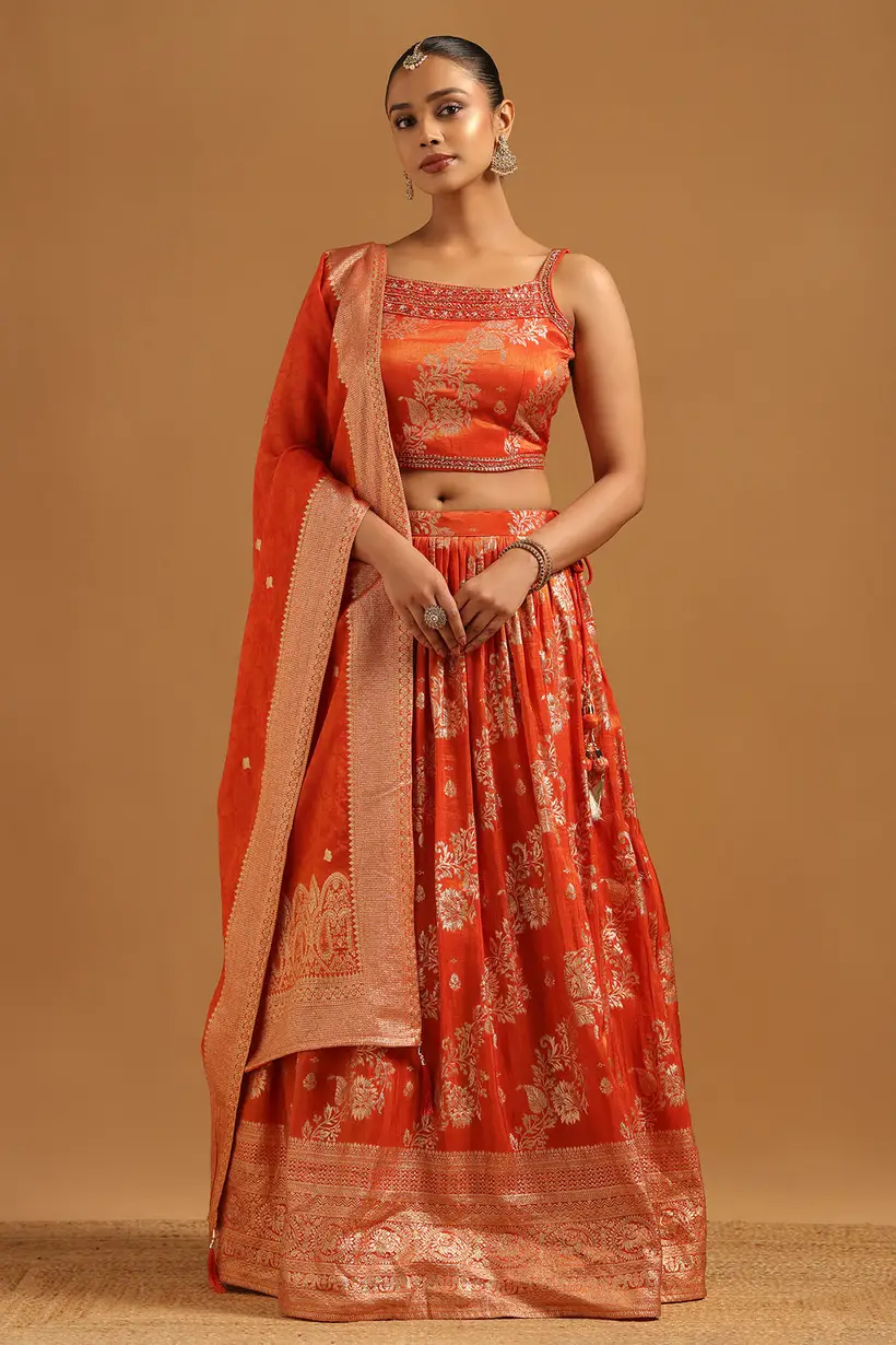 Rust Brocade Zari Woven Lehenga With Mirror & Stone
